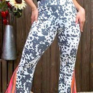 Southern Stitch , pull on bell bottoms, with cow print and serape printed insert